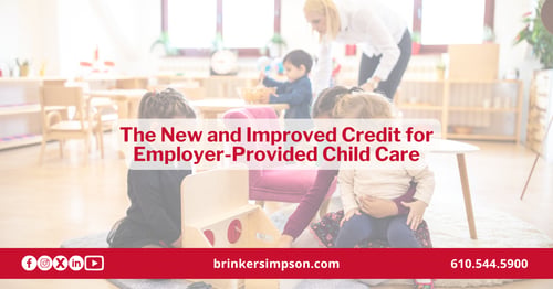 Business owner reviewing employee benefit options including the employer-provided child care tax credit