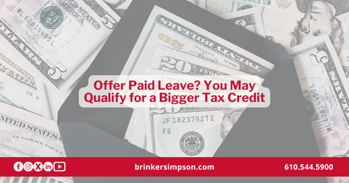 Envelope with cash, representing the paid family and medical leave tax credit